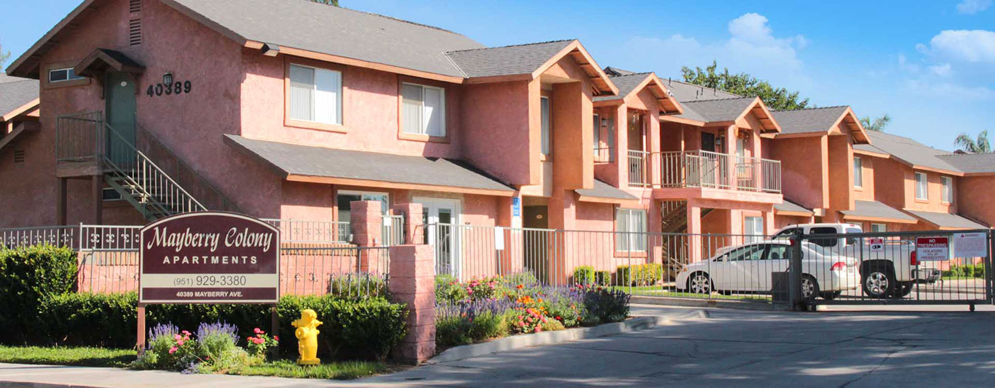 This image shows the exterior of one of the Mayberry Colony apartment units